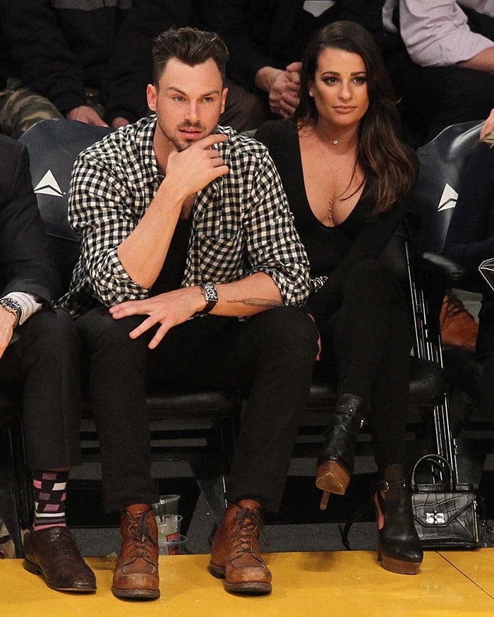 Matthew Paetz and Lea Michele watch the Los Angeles Lakers game on January 5, 2016