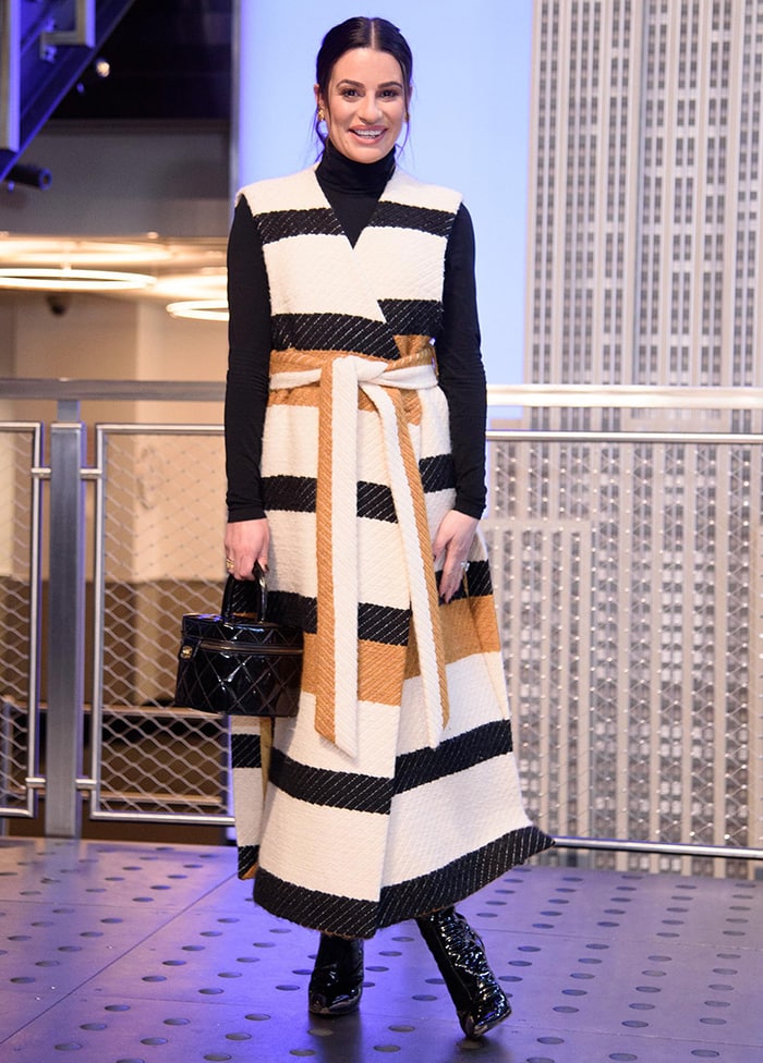 Lea Michele in Ulla Johnson vest coat at the 2019 Holiday Light Show at the Empire State Building in New York City on December 3, 2019