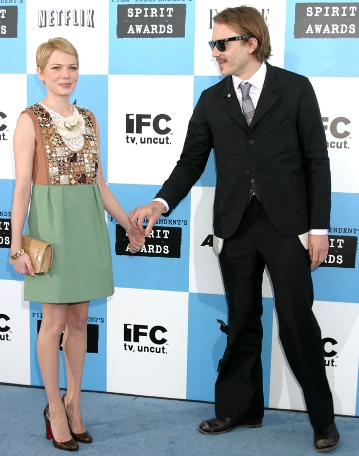 Holding hands at the 2007 Film Independent Spirit Awards, Michelle Williams—wearing a heavily-embellished Chloé mini dress and classic Louboutin pumps—perfectly complemented Heath Ledger’s tailored, laid-back suit
