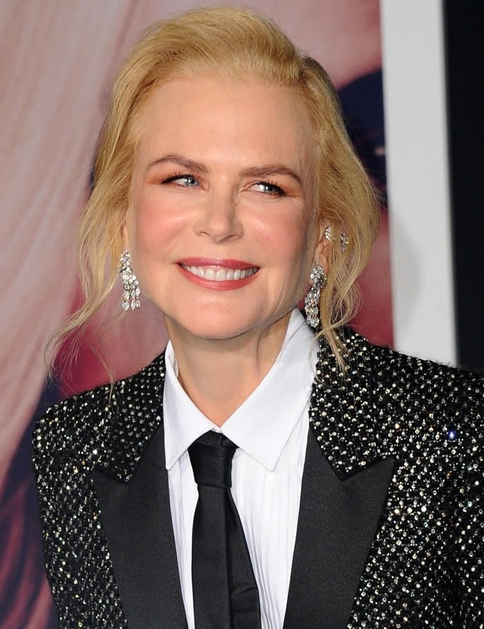 Nicole Kidman wore a black shimmery blazer over a white button-down top