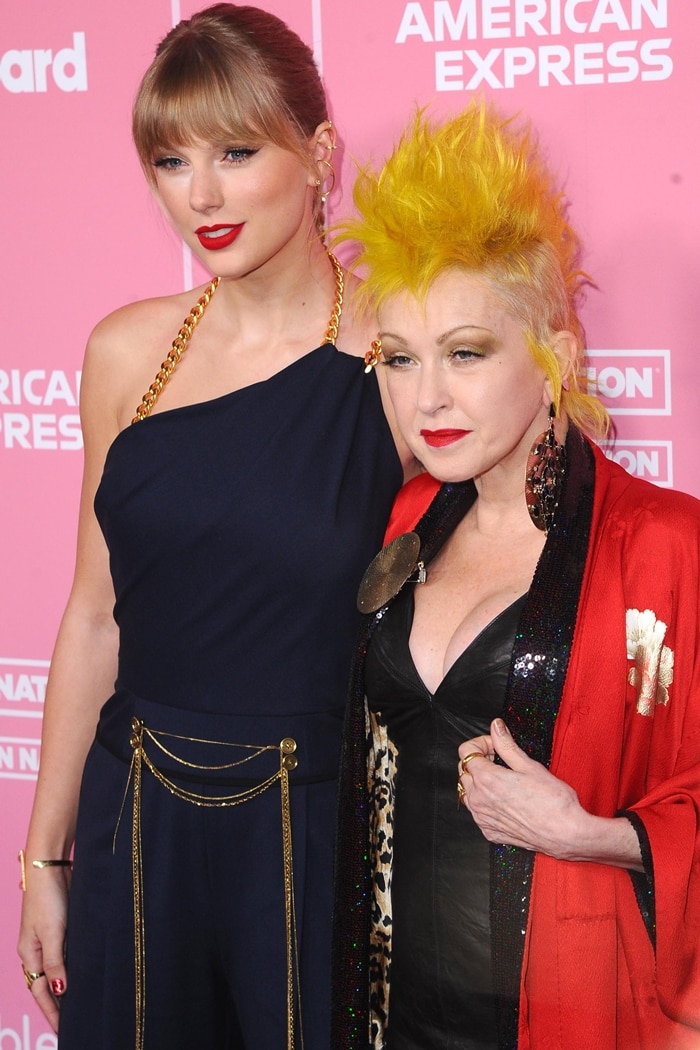 With Taylor Swift standing at 5ft 9¼ (175.9 cm) and Cyndi Lauper at 5ft 3 (160 cm), their height difference is striking as they pose together
