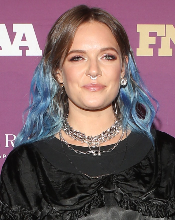 Tove Lo flaunts her septum ring and wears her dip dye blue hair in loose waves