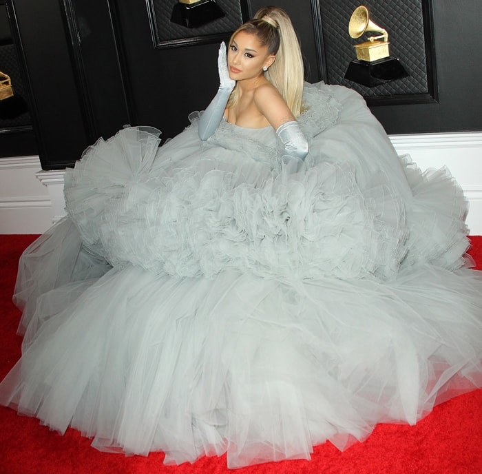 Ariana Grande transforms the Grammy Awards red carpet into a couture fairy tale in her custom Giambattista Valli Haute Couture gown, its cascading layers of gray tulle creating one of the most memorable fashion moments of the 2020 ceremony