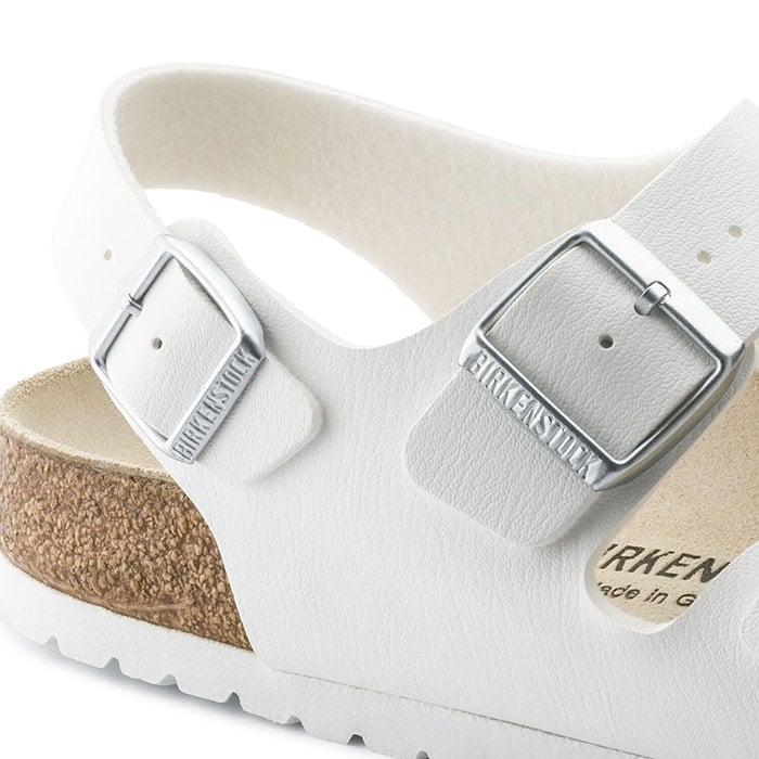 Sandals with large buckles have "BIRKENSTOCK" debossed logo
