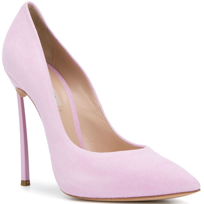 The Casadei “Flamingo” pumps stand alone in pale pink suede, defined by their sharp pointed toe and towering stiletto heel
