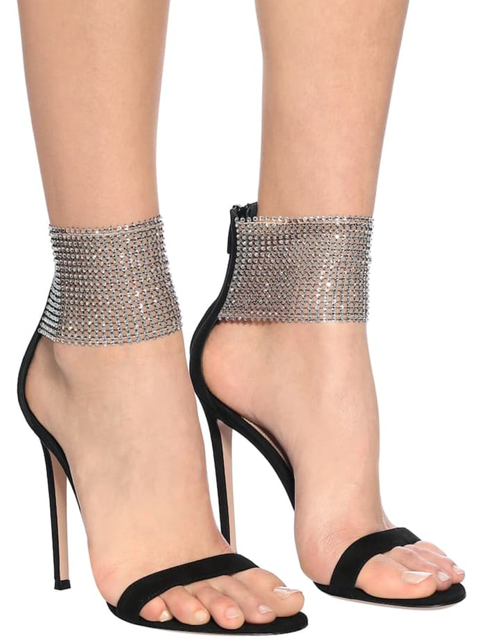 The rear zipper and flexible crystal mesh cuff highlight the innovative construction that made Gianvito Rossi's 'Adore' sandals one of the standout evening shoe designs of the era
