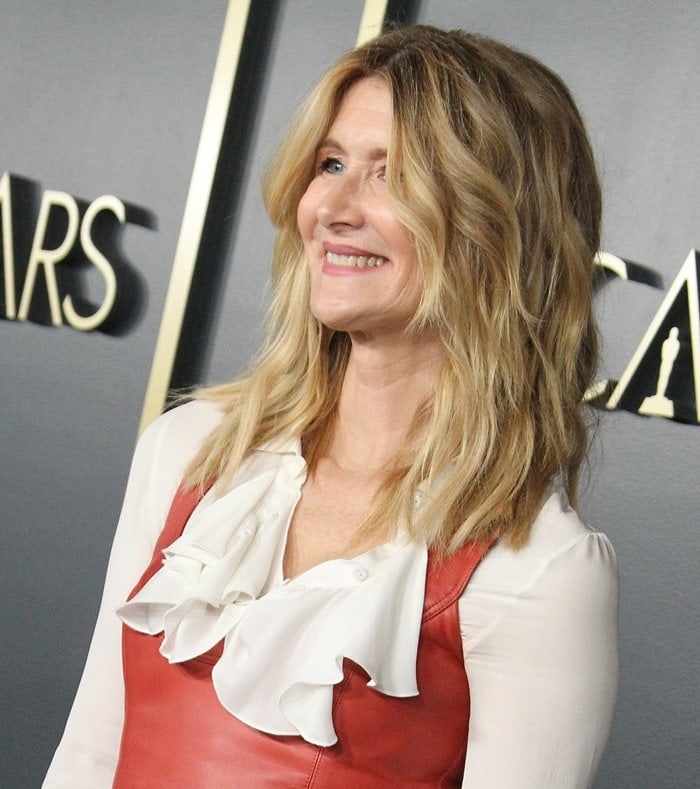 Laura Dern pairs soft, tousled waves with a ruffled white silk-chiffon blouse at the 92nd Oscars Nominees Luncheon