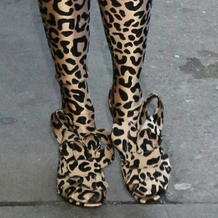A closer look at Anya Taylor-Joy’s matching Halpern leopard-print bow-embellished heels, styled seamlessly with her head-to-toe animal-print jumpsuit