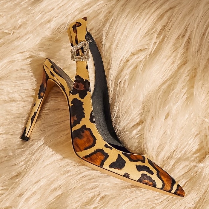 The Giuseppe Zanotti Samia pumps pair a classic pointed-toe stiletto with leopard-print silk and a crystal-embellished slingback strap, adding a jewelry-like finish to a sleek, leg-lengthening silhouette