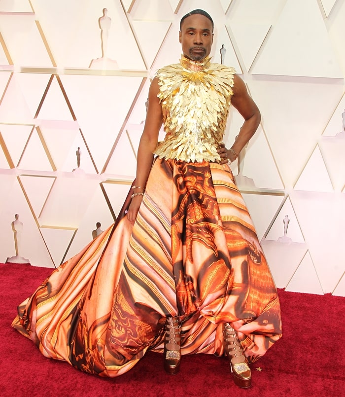 Billy Porter commanded the 2020 Academy Awards red carpet at the Dolby Theatre by grounding his dramatic Giles Deacon couture look with towering gold platform heels that added height, balance, and unmistakable footwear drama on February 9, 2020