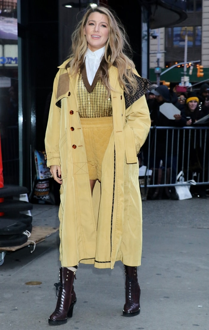 Blake Lively's maple trench coat has a slightly oversized cut cinched with an adjustable belt and is finished with polished tortoise-effect trim