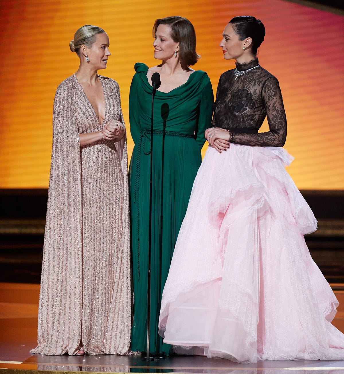 Brie Larson, Sigourney Weaver, and Gal Gadot present the Oscar for Original Score during the 92nd Academy Awards at the Dolby Theatre in Hollywood on February 9, 2020