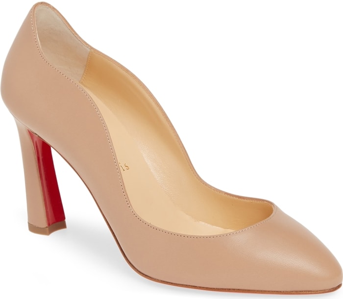 The Christian Louboutin Agneska Wave pump combines an almond toe, flowing scalloped topline, and flared 85 mm heel for a softer take on the classic court shoe