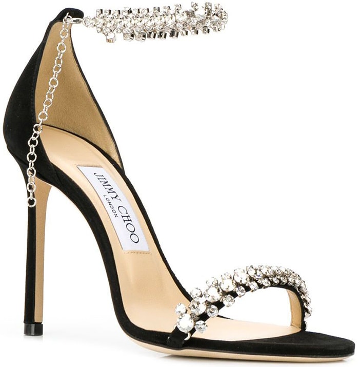 The Jimmy Choo Shiloh 100 reimagines the silhouette in black suede accented with faceted crystal detailing
