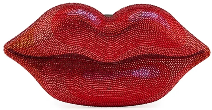 Judith Leiber Couture's crystal-encrusted Hot Lips clutch transforms a playful red-lip silhouette into a dazzling evening statement, blending novelty design with the label's signature red-carpet glamour
