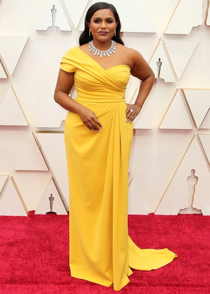 Mindy Kaling brightened up the red carpet in Dolce Gabbana while arriving at the 2020 Academy Awards