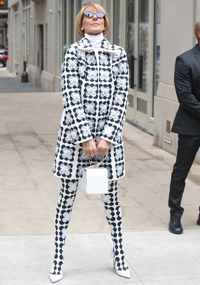 Céline Dion channels 1960s mod style in New York City in a floral 8 Moncler Richard Quinn coat and matching tights, grounded by optic-white Gianvito Rossi Gianvito 105 pumps
