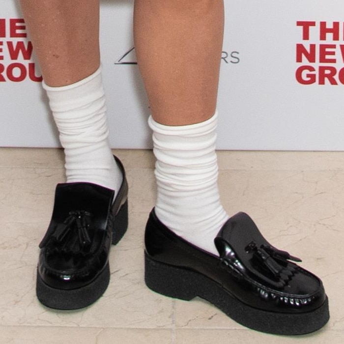 Chloë Sevigny put an unexpected twist on her look, pairing chunky black loafers with white ankle socks