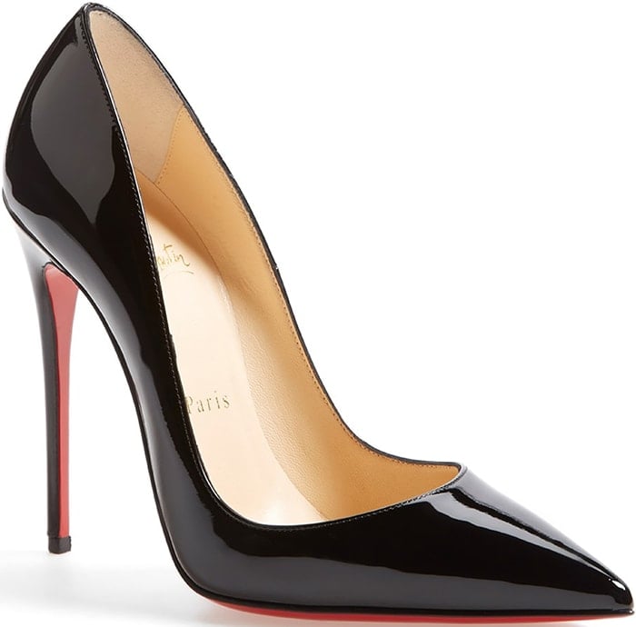 The Christian Louboutin So Kate pump in black patent leather is defined by its razor-sharp pointed toe, glossy finish, and signature red-lacquered sole atop a towering stiletto heel