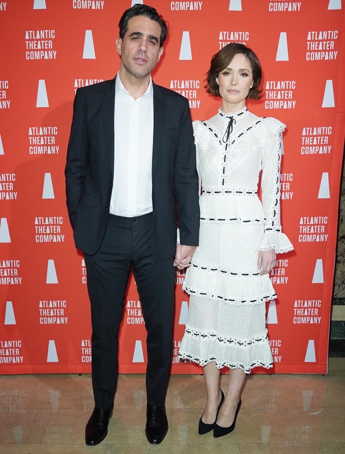 Rose Byrne pairs a white Zimmermann Honour blouse and matching tiered skirt with classic black pointed-toe pumps while attending the Atlantic Theater Company’s Couples’ Choice Gala with Bobby Cannavale at New York City’s Plaza Hotel