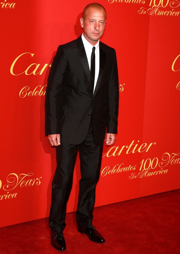 Helmut Lang at Cartier’s 100th Anniversary in America celebration at the Cartier Fifth Avenue Mansion in New York City on April 30, 2009, showcasing his signature minimalist tailoring in a sleek black suit