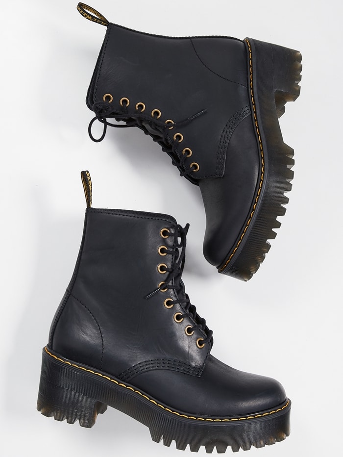 Dr. Martens Shriver Hi Wyoming Leather Boots feature a softly grained, burnished finish with antiqued brass eyelets, set on a chunky 2-inch heel and 1.5-inch platform for height with everyday stability