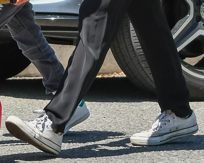 Kate Mara grounded her off-duty look with classic black-and-white Converse Chuck Taylor sneakers, their low-profile canvas build and rubber toe cap adding an effortless, lived-in finish to the relaxed layers