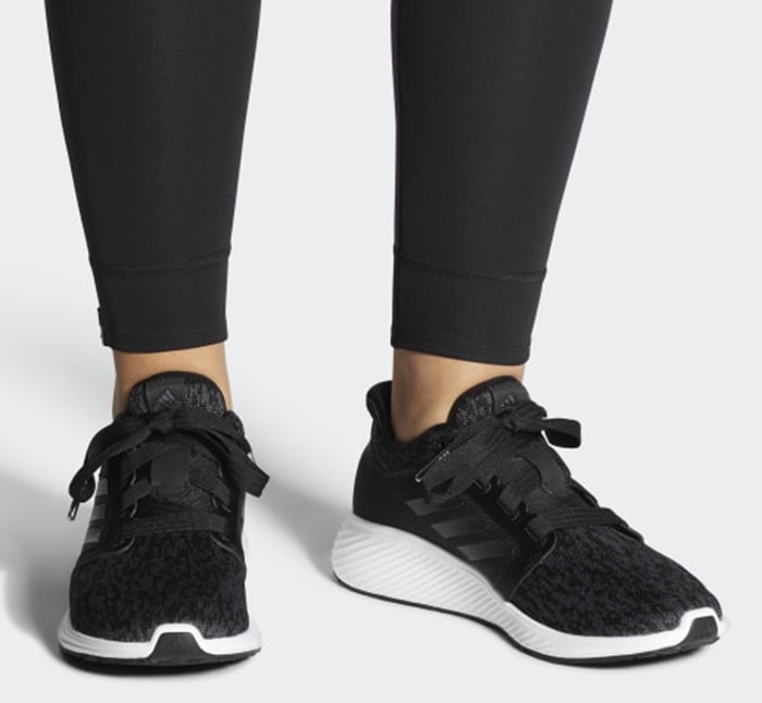 Adidas’ Edge Lux 3 sneakers feature a breathable stretch-mesh upper and lightweight Bounce cushioning, designed as a versatile women’s training shoe that transitions easily from gym workouts to everyday wear