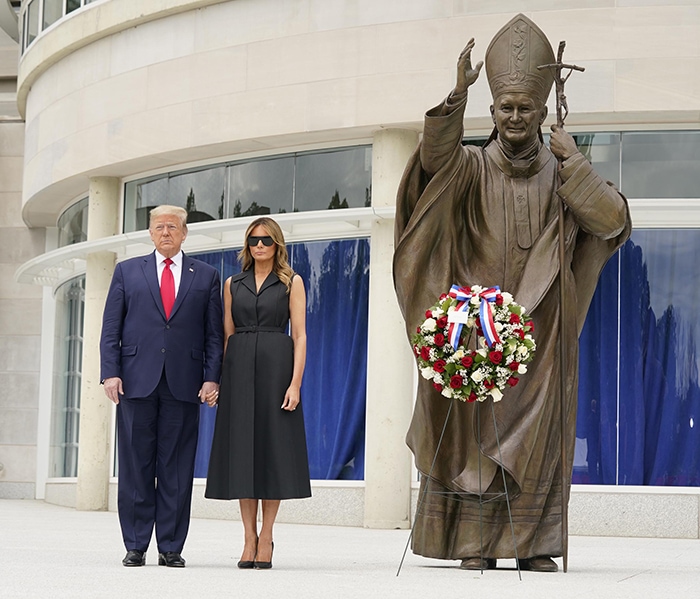 Donald Trump and Melania Trump honor Saint John Paul II with a ceremonial wreath