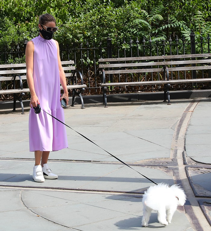 Olivia Palermo goes braless in a Tibi lavender dress as she walks her dog, Mr. Butler, in New York City on June 25, 2020