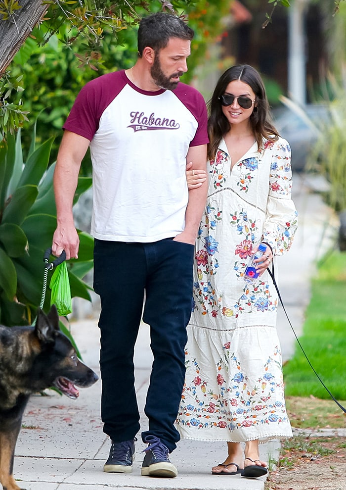 Ben Affleck kept it casual in dark blue jeans, a maroon-sleeved “Habana” tee, and laid-back sneakers with beige soles