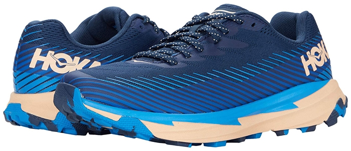 Hoka One One “Torrent 2” trail shoes combine lightweight engineered mesh with a cushioned Profly midsole and grippy lugged outsole, balancing responsiveness and traction for everyday runs and walks