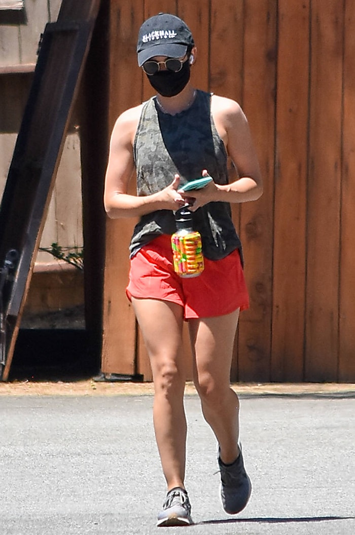 Lucy Hale wore Nike Air Zoom Pegasus sneakers from a lineage that dates back to 1983, when the Pegasus debuted as Nike’s accessible, “every runner” performance shoe—long before it became a go-to off-duty favorite for celebrities