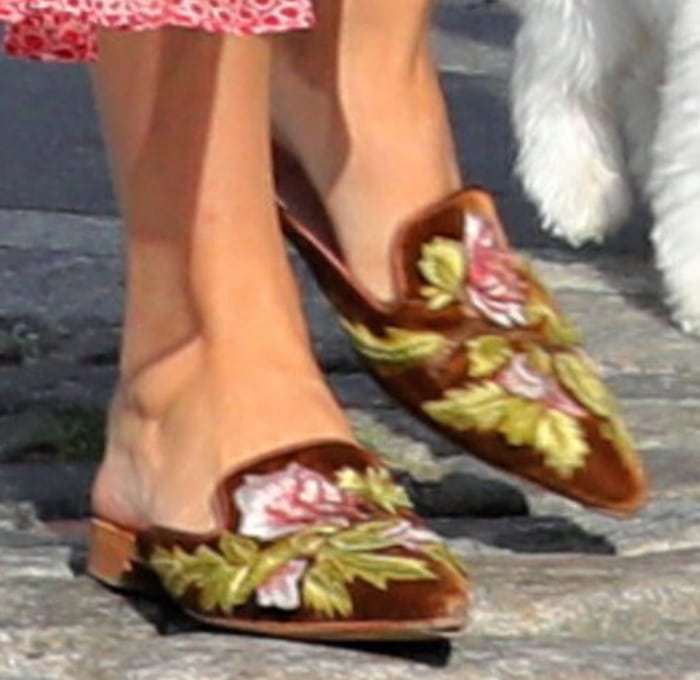 A closer look at Olivia Palermo's embroidered Alberta Ferretti velvet mules featuring a floral motif and low stacked heel