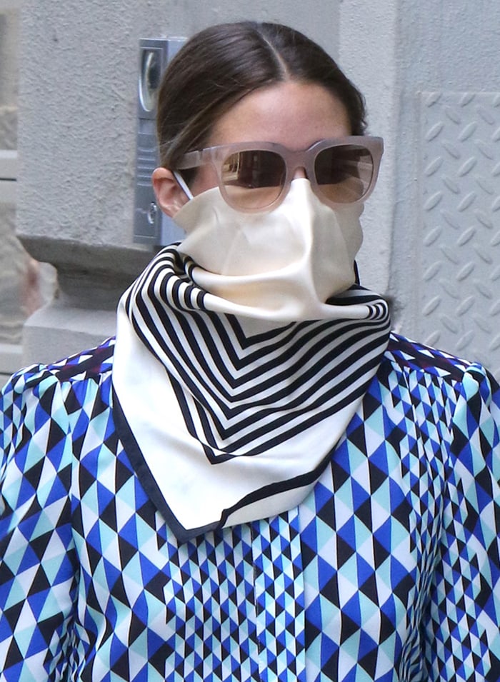 Olivia Palermo wears Westward Leaning sunglasses and a cream-and-black Le Scarf kerchief