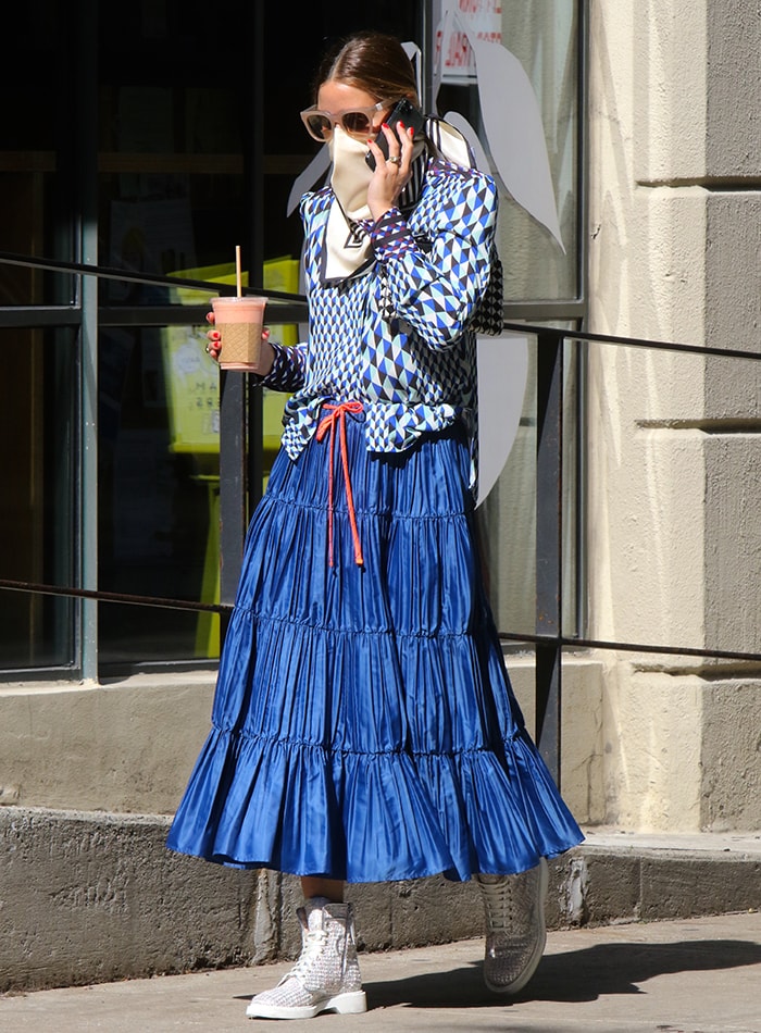 Olivia Palermo steps out in a Max Co. maxi skirt to get her coffee