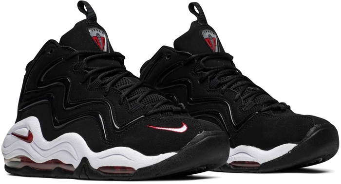 Scottie Pippen’s first signature shoe, the Nike Air Pippen in black and varsity red, features bold wavy overlays, visible Air cushioning, and a distinctive 1990s design that reflects the Chicago Bulls era of basketball dominance