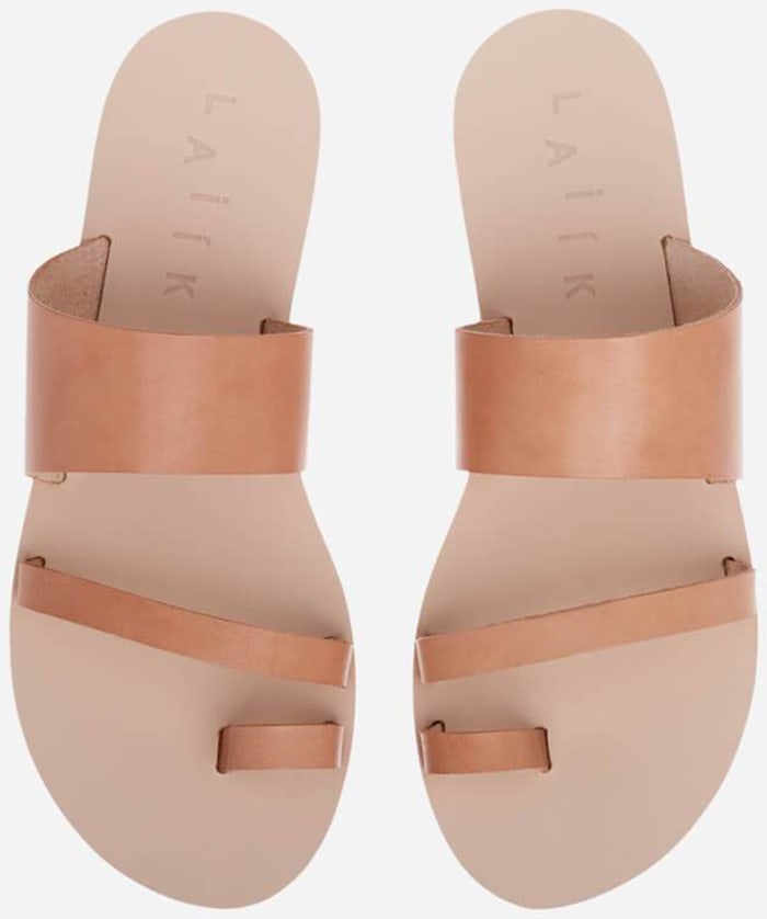 Laiik’s bestselling “Ani” sandals reinterpret classic Greek slides with smooth vegetable-tanned leather straps, minimalist asymmetrical lines, and an understated handmade finish inspired by traditional Mediterranean footwear