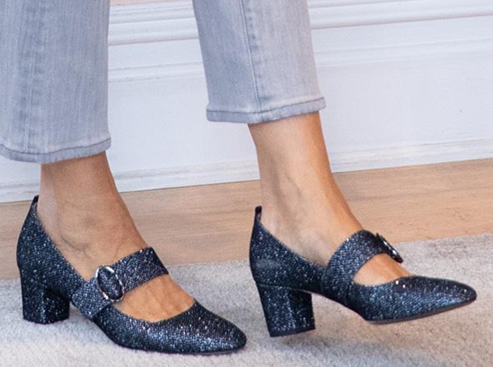 Sarah Jessica Parker slips into her glittering SJP by Sarah Jessica Parker “Tartt” Mary Jane pumps, a vintage-inspired style finished with a sturdy block heel and oval buckle strap