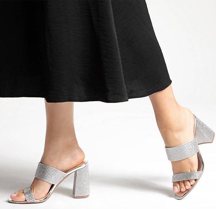 Dazzling rhinestones embellish the Brita sandals that are fitted with two bands to create modern layering