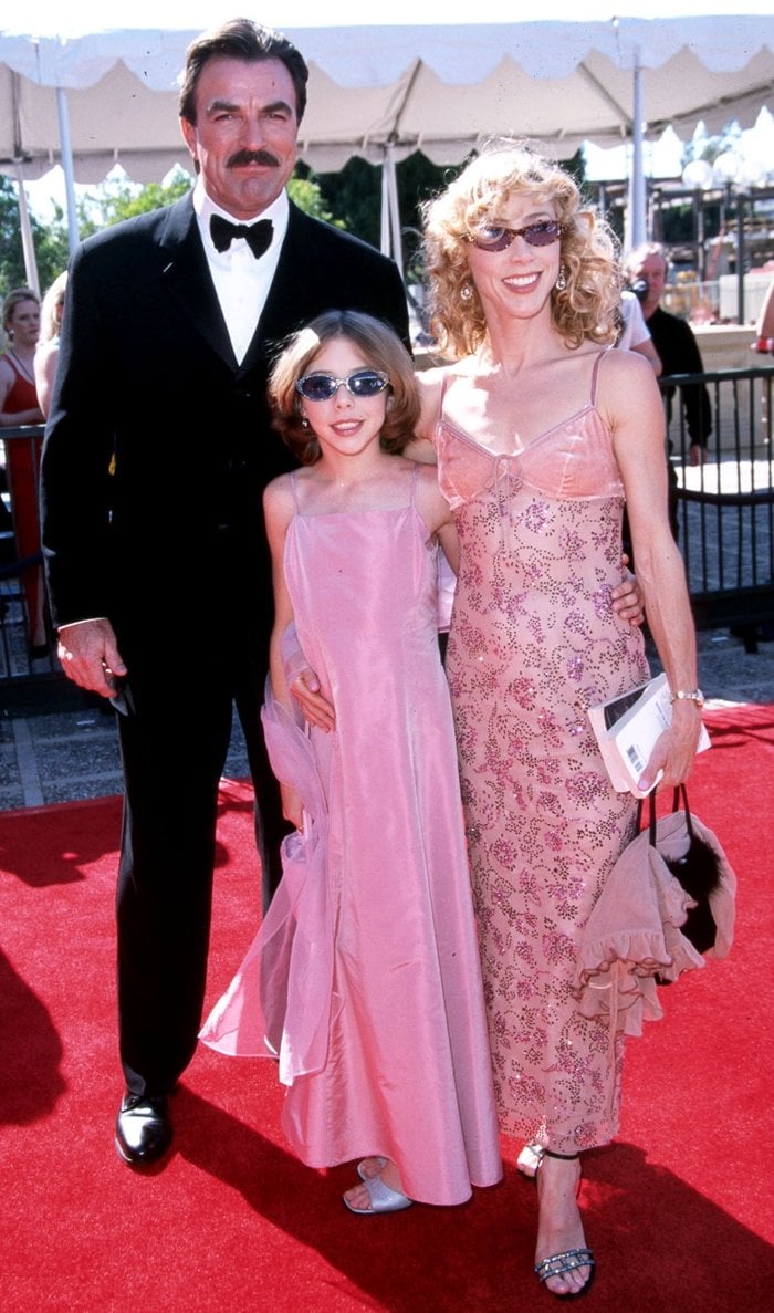 Tom Selleck attends the 2000 Emmy Awards with his wife Jillie Mack, who dazzles in a blush pink slip dress and jeweled heels, and their daughter Hannah Margaret Selleck, who coordinated in a satin pink gown and silver sandals
