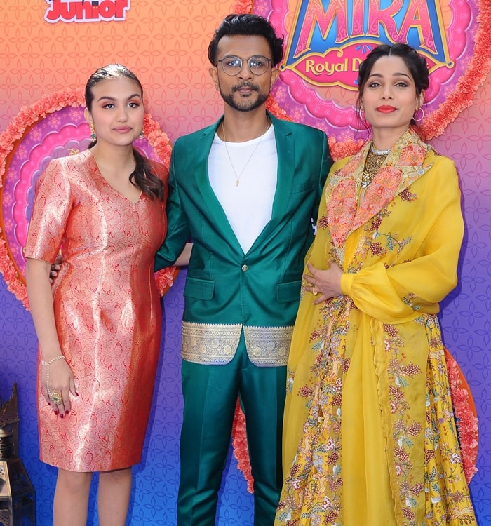 Leela Ladnier, Utkarsh Ambudkar, and Freida Pinto attend the premiere of Disney Junior's