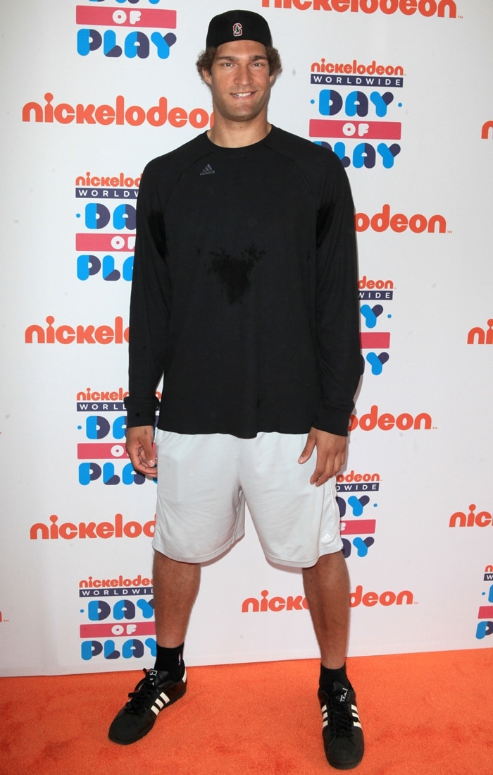 American professional basketball player Brook Lopez, who stands 7 ft 0 in (2.13 m), shows off his Adidas sneakers in a massive US size 20 at Nickelodeon’s Worldwide Day of Play