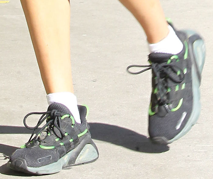 The Adidas LXCON “Dart Frog” sneakers stand out with neon green piping and a chunky silhouette inspired by the brand’s 1990s Lexicon runner