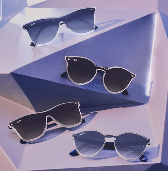A curated display of authentic Ray-Ban sunglasses highlights the brand’s modern designs, produced in manufacturing facilities worldwide, including in China