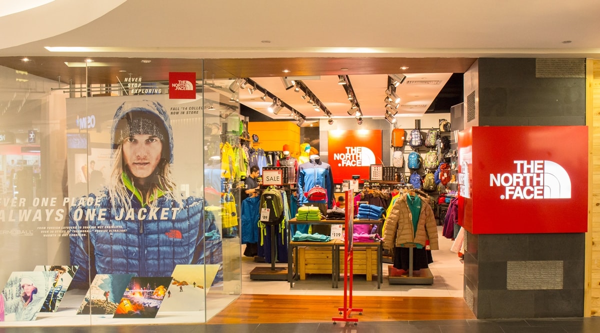 Inside a North Face store showcasing their latest outdoor apparel and accessories, perfect for both adventure enthusiasts and style-conscious shoppers