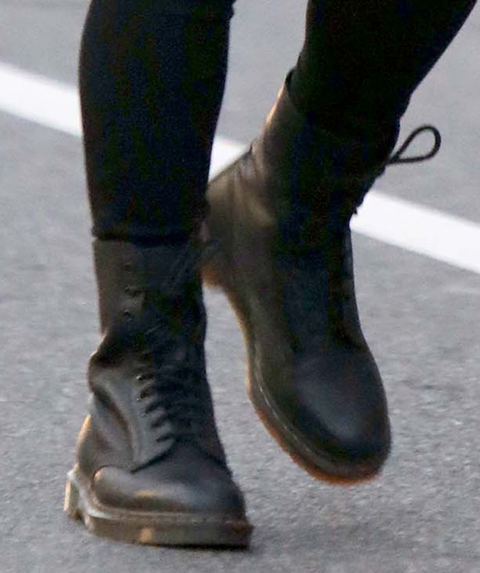 Hailee Steinfeld wears black Dr. Martens 1490 10-eye combat boots while filming Hawkeye in New York City in December 2020