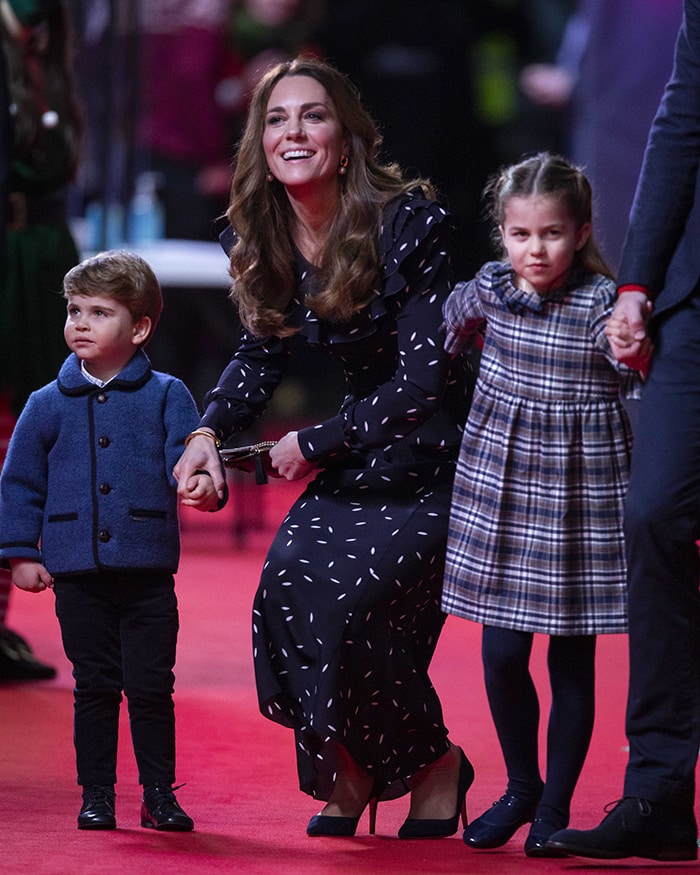 A closer look at Kate Middleton's navy Prada pumps, worn with her Alessandra Rich midi dress at The London Palladium
