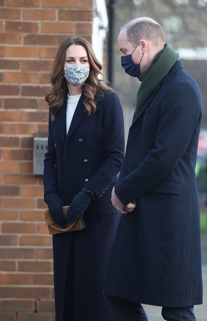 Kate Middleton wears navy Emmy London pumps during the Royal Train Tour