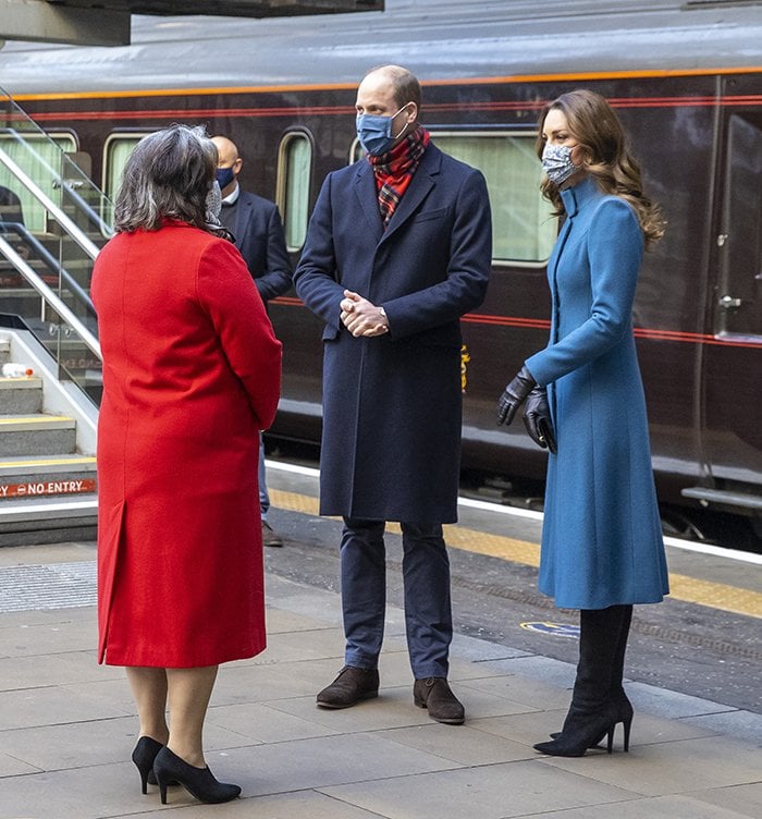 Kate Middleton pairs her cornflower-blue Catherine Walker coat with black suede Stuart Weitzman for Russell Bromley HalfnHalf stretch rider boots
